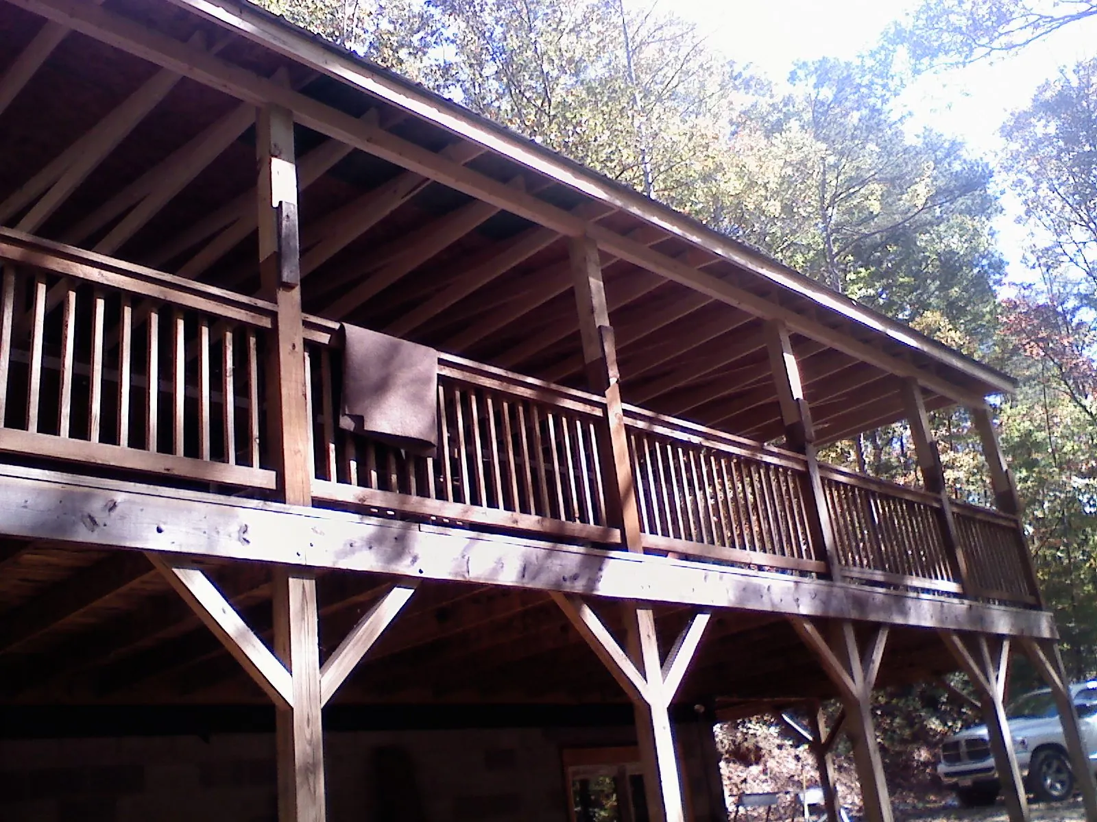 Timber framing under a new elevated porch and deck — Roof Leak Repair in Klickitat by Roofing Brothers
